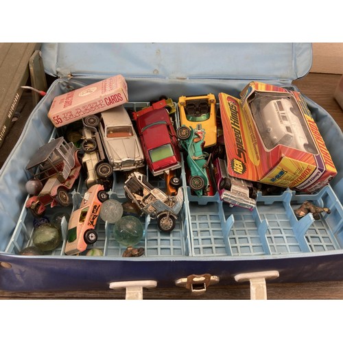 338 - A collection of vintage toys and games to include Vic-toy Master Mind, Jimson no. 60008 friction pow... 