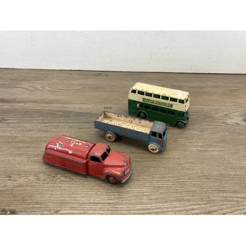 340 - Seven Dinky Toys diecast model vehicles to include three boxed 197 Morris Mini-Travellers etc.