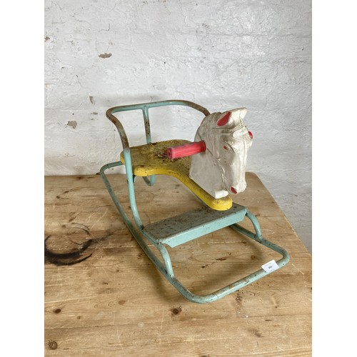 349 - Two vintage child's items, one metal and wooden sledge and one Tri-ang rocking horse