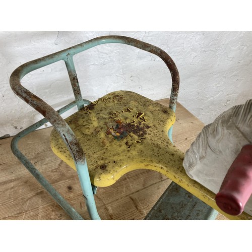 349 - Two vintage child's items, one metal and wooden sledge and one Tri-ang rocking horse