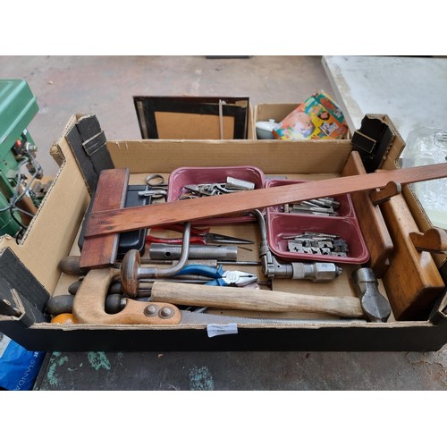 691 - Two boxes containing tools and DIY equipment to include vintage BCE cast metal and green enamel clam... 