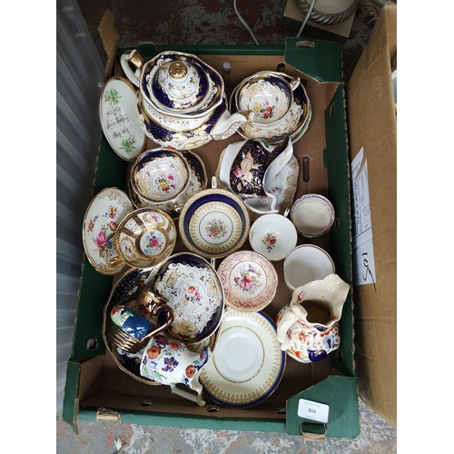 804 - Three boxes containing glassware and ceramics to include Royal Paragon, Royal Albert, Noritake, late... 