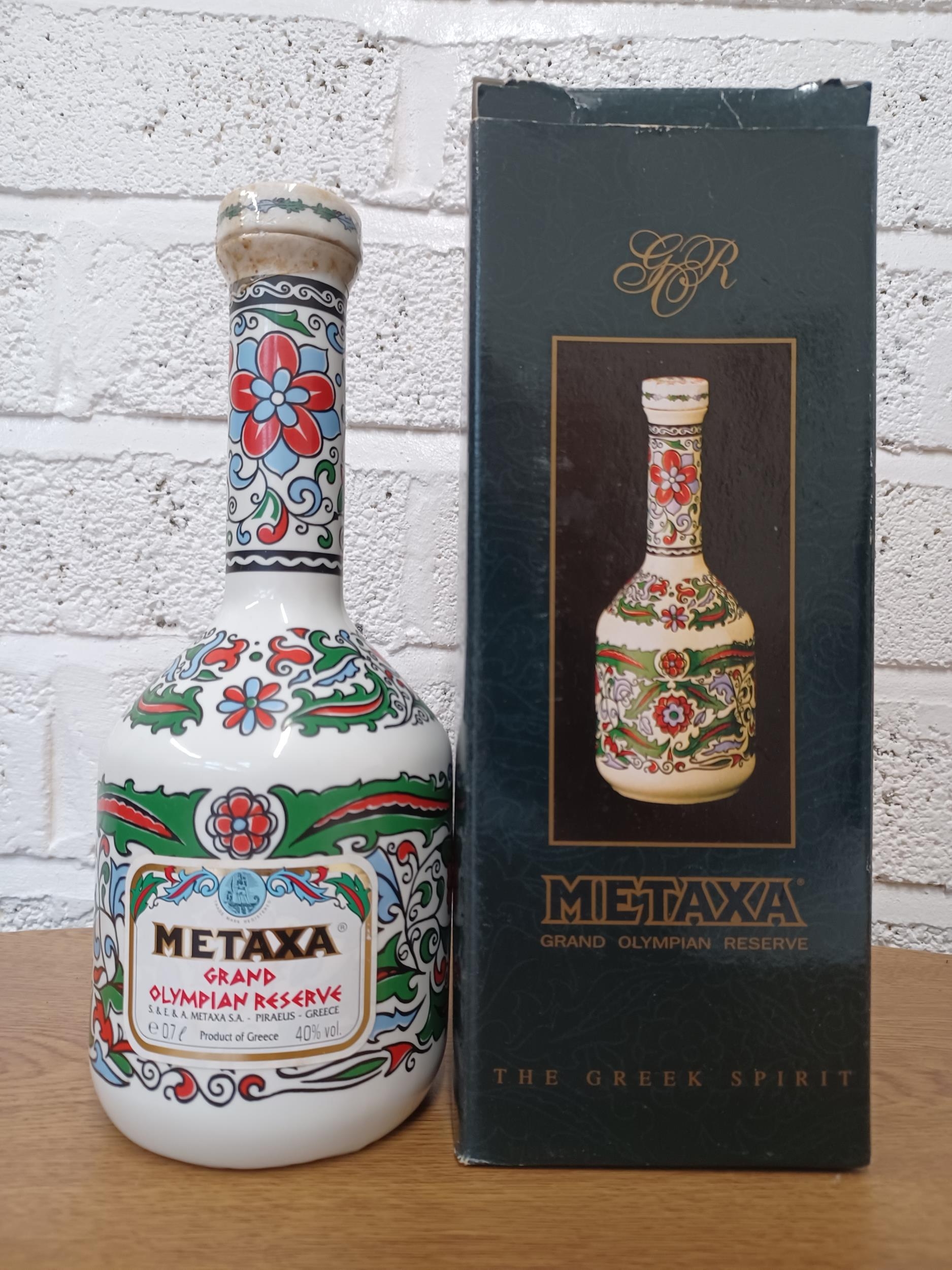 A boxed 70cl porcelain decanter of Metaxa Grand Olympian Reserve