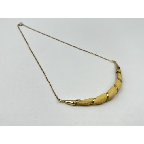 1216 - A Victorian 9ct gold and carved horn pendant necklace - approx. gross weight 6.6 grams