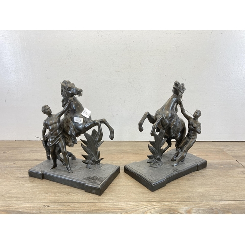 677 - A pair of Guillaume Marly style spelter rearing horse figurines - approx. 27cm high x 23cm long x 12... 