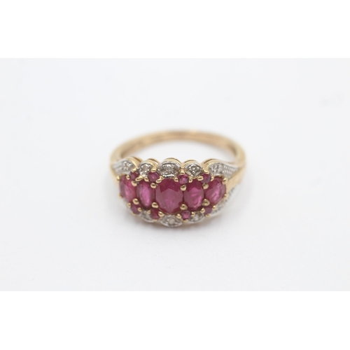 1002 - A 9ct gold ruby and diamond set cluster cocktail ring, size P½ - approx. gross weight 3.3 grams