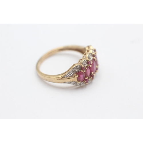 1002 - A 9ct gold ruby and diamond set cluster cocktail ring, size P½ - approx. gross weight 3.3 grams