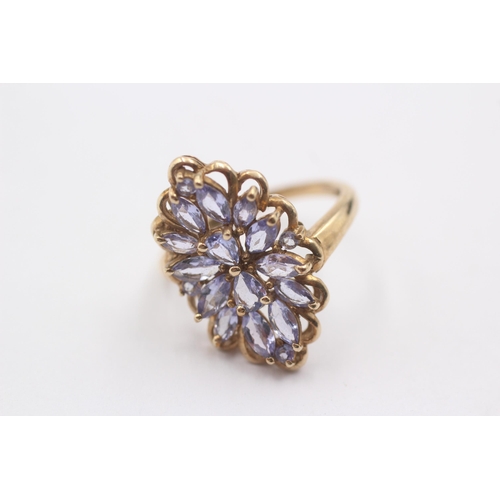 1005 - A 9ct gold tanzanite cluster ring - approx. gross weight 3.4 grams