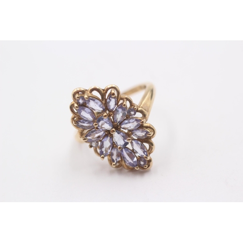 1005 - A 9ct gold tanzanite cluster ring - approx. gross weight 3.4 grams