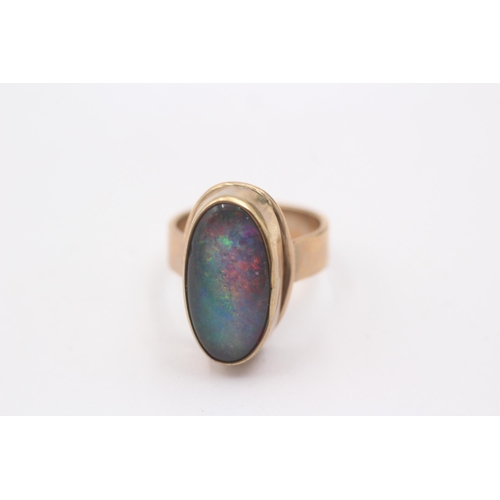 1007 - A 9ct gold opal cocktail ring, size M½ - approx. gross weight 6 grams