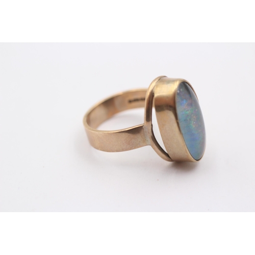 1007 - A 9ct gold opal cocktail ring, size M½ - approx. gross weight 6 grams