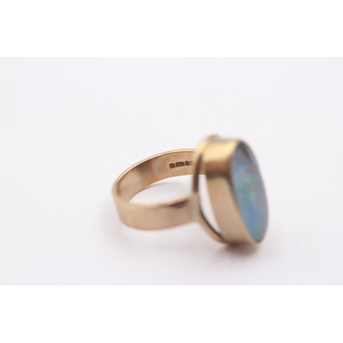 1007 - A 9ct gold opal cocktail ring, size M½ - approx. gross weight 6 grams