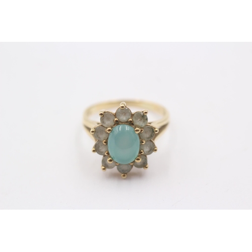 1011 - A 9ct gold blue paste cluster ring - approx. gross weight 3.3 grams