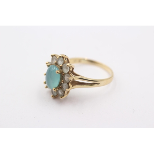 1011 - A 9ct gold blue paste cluster ring - approx. gross weight 3.3 grams