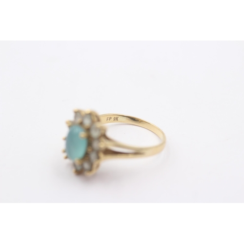 1011 - A 9ct gold blue paste cluster ring - approx. gross weight 3.3 grams