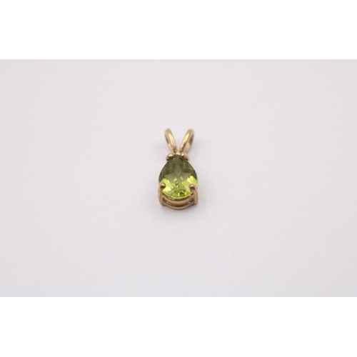 1018 - Three 9ct gold gemstone pendants, one blue topaz, one amethyst, and one peridot - approx. gross weig... 