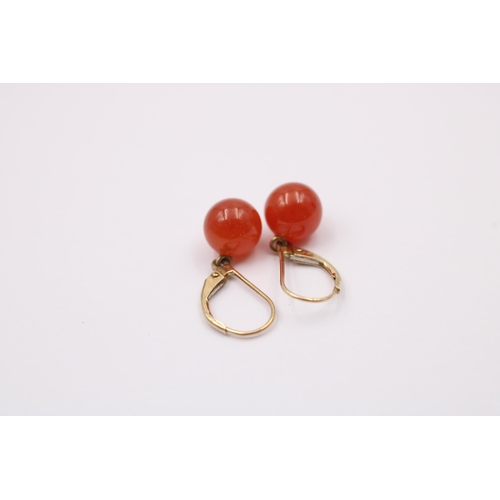 1082 - A pair of 9ct gold carnelian drop earrings - approx. gross weight 2.6 grams