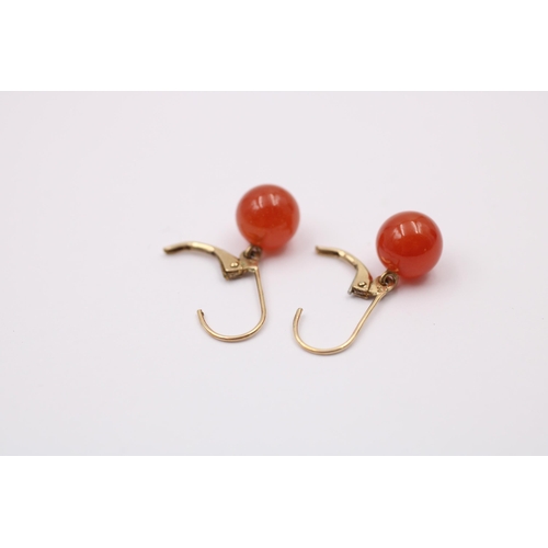 1082 - A pair of 9ct gold carnelian drop earrings - approx. gross weight 2.6 grams