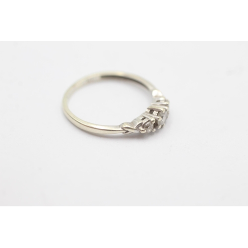 1088 - A 9ct white gold diamond graduated trilogy ring, size L - approx. gross weight 1.3 grams