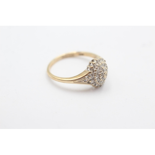 1094 - A 9ct gold diamond cluster and shoulder set statement ring - approx. gross weight 2.4 grams