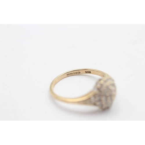 1094 - A 9ct gold diamond cluster and shoulder set statement ring - approx. gross weight 2.4 grams