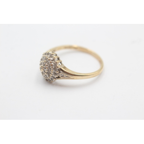 1094 - A 9ct gold diamond cluster and shoulder set statement ring - approx. gross weight 2.4 grams