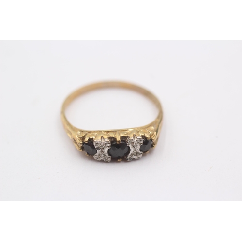 1096 - A 9ct gold diamond and sapphire graduated seven stone dress ring, size R - approx. gross weight 2.1 ... 