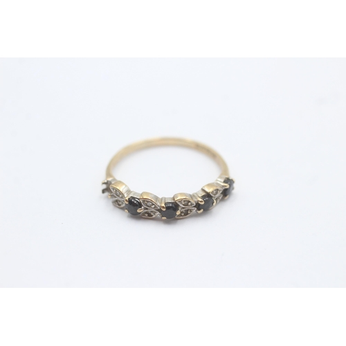 1097 - A 9ct gold diamond and sapphire half eternity ring, size P½ - approx. gross weight 1.6 grams