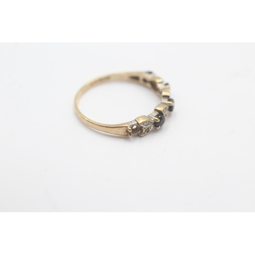 1097 - A 9ct gold diamond and sapphire half eternity ring, size P½ - approx. gross weight 1.6 grams