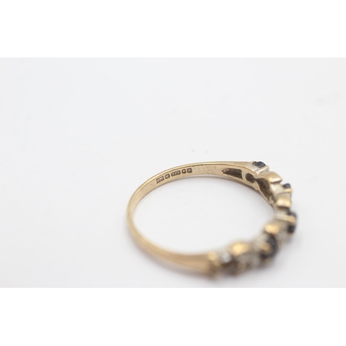 1097 - A 9ct gold diamond and sapphire half eternity ring, size P½ - approx. gross weight 1.6 grams