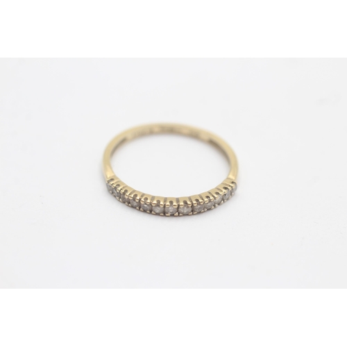 1100 - A 9ct gold diamond pave half eternity ring - approx. gross weight 1.3 grams