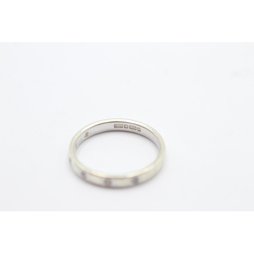 1101 - A 9ct white gold diamond flash set half eternity ring - approx. gross weight 2.6 grams