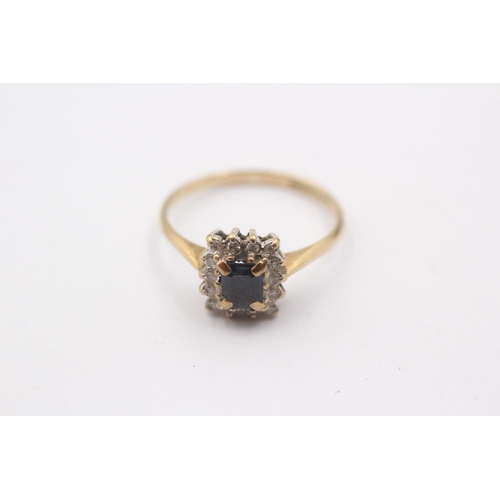 1104 - A 9ct gold diamond and sapphire set cluster ring, size N½ - approx. gross weight 1.8 grams