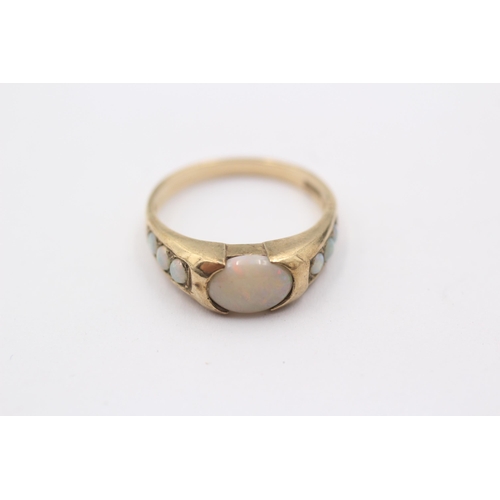 1105 - A 9ct gold opal set dress ring - approx. gross weight 2.8 grams