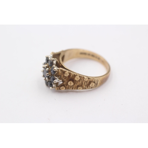 1113 - A 9ct gold sapphire set floral cluster ring - approx. gross weight 4 grams