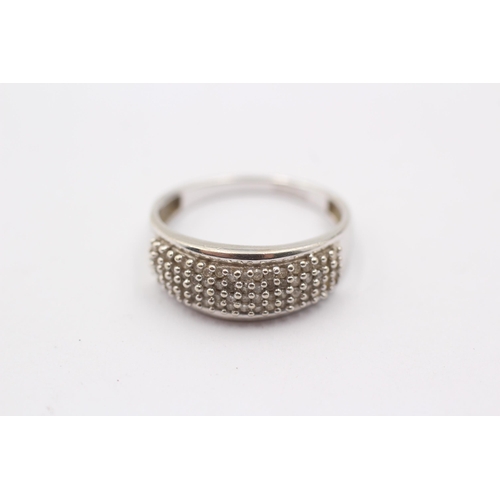 1115 - A 9ct white gold diamond set cocktail ring - approx. gross weight 2.3 grams