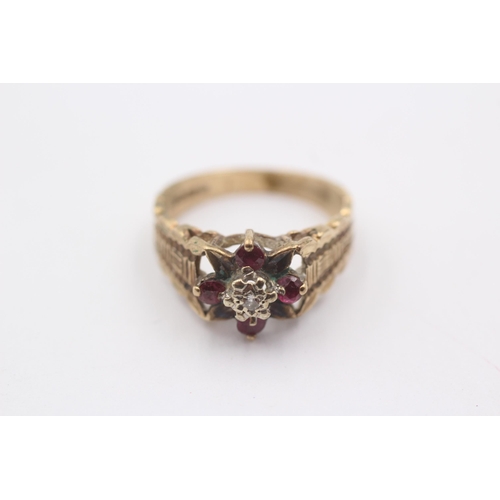 1118 - A 9ct gold ruby and diamond set floral cluster ring - approx. gross weight 3.4 grams