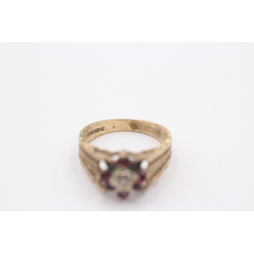 1118 - A 9ct gold ruby and diamond set floral cluster ring - approx. gross weight 3.4 grams