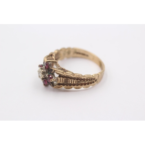 1118 - A 9ct gold ruby and diamond set floral cluster ring - approx. gross weight 3.4 grams