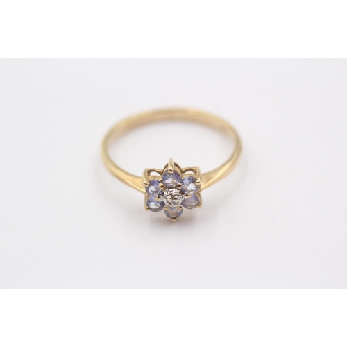 1120 - A 9ct gold tanzanite and diamond set floral cluster ring - approx. gross weight 1.8 grams