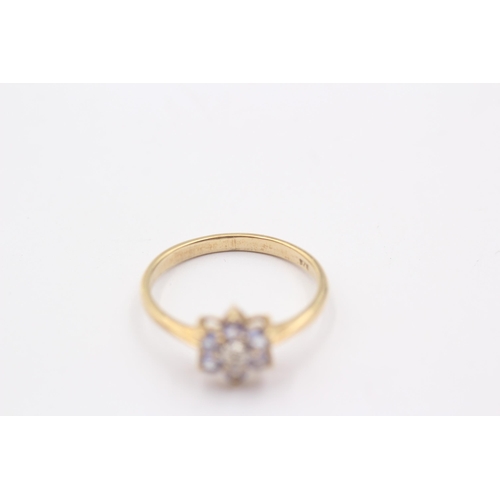 1120 - A 9ct gold tanzanite and diamond set floral cluster ring - approx. gross weight 1.8 grams