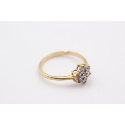 1120 - A 9ct gold tanzanite and diamond set floral cluster ring - approx. gross weight 1.8 grams