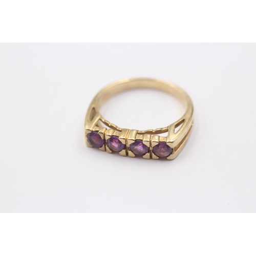 1126 - A 9ct gold amethyst set four stone ring - approx. gross weight 3.3 grams