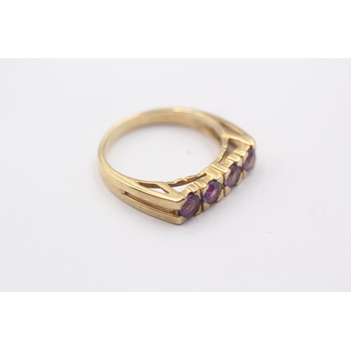 1126 - A 9ct gold amethyst set four stone ring - approx. gross weight 3.3 grams