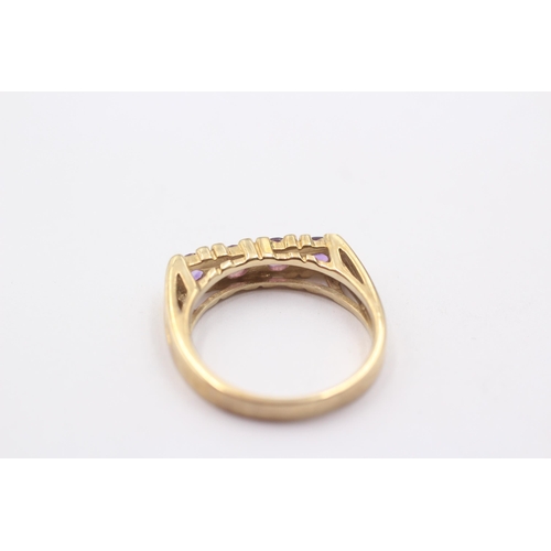 1126 - A 9ct gold amethyst set four stone ring - approx. gross weight 3.3 grams