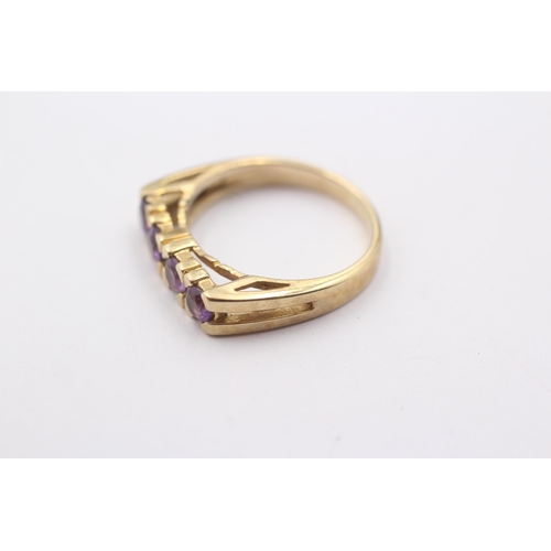 1126 - A 9ct gold amethyst set four stone ring - approx. gross weight 3.3 grams