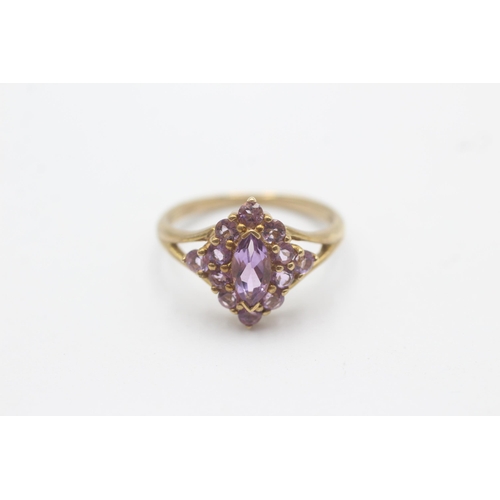 1128 - A 9ct gold amethyst navette cluster split shank ring - approx. gross weight 3 grams