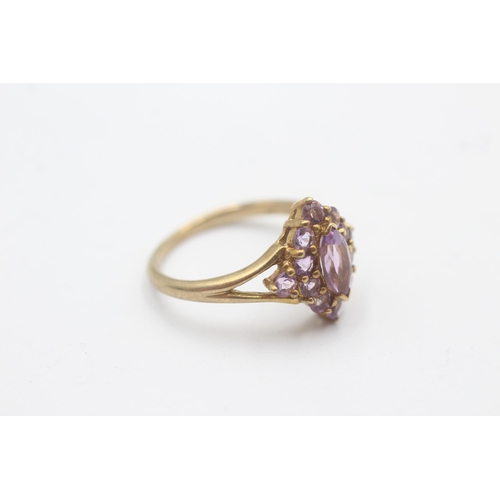 1128 - A 9ct gold amethyst navette cluster split shank ring - approx. gross weight 3 grams