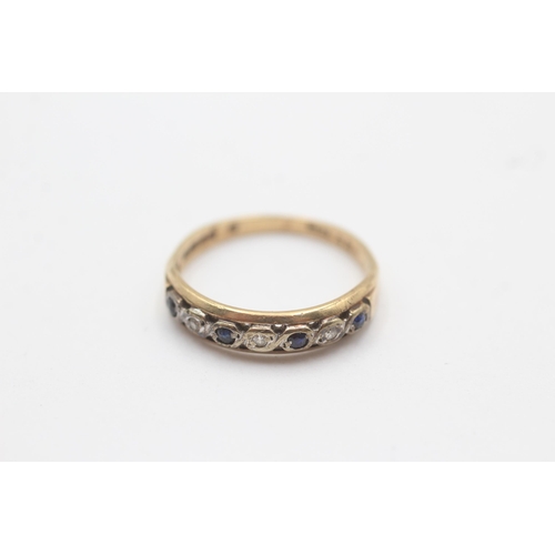 1133 - A 9ct gold diamond and sapphire seven stone ring, size L½ - approx. gross weight 1.7 grams