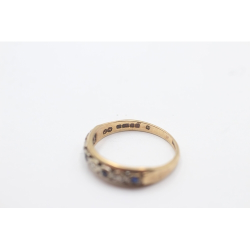 1133 - A 9ct gold diamond and sapphire seven stone ring, size L½ - approx. gross weight 1.7 grams